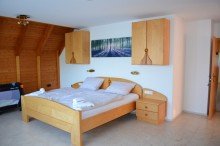 Zimmer im 2. Obergeschoss Ger�umiges Zuhause mit beeindruckender Aussicht, gro�en Balkonen und Terrasse