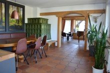 Essecke mit Kachelofen im 1. Obergeschoss Ger�umiges Zuhause mit beeindruckender Aussicht, gro�en Balkonen und Terrasse